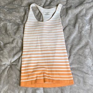 Orange and white tank
